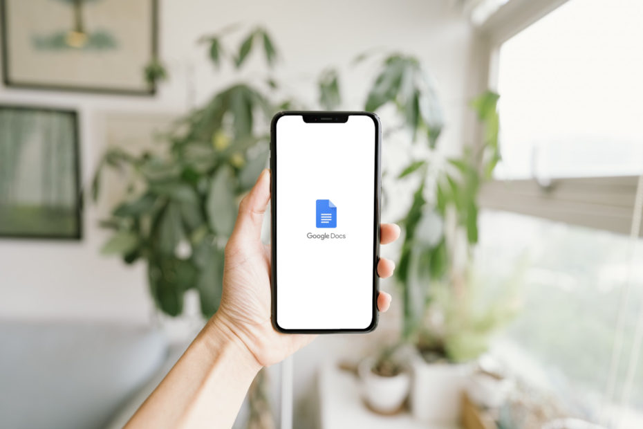 Person using Google Voice transcription on phone